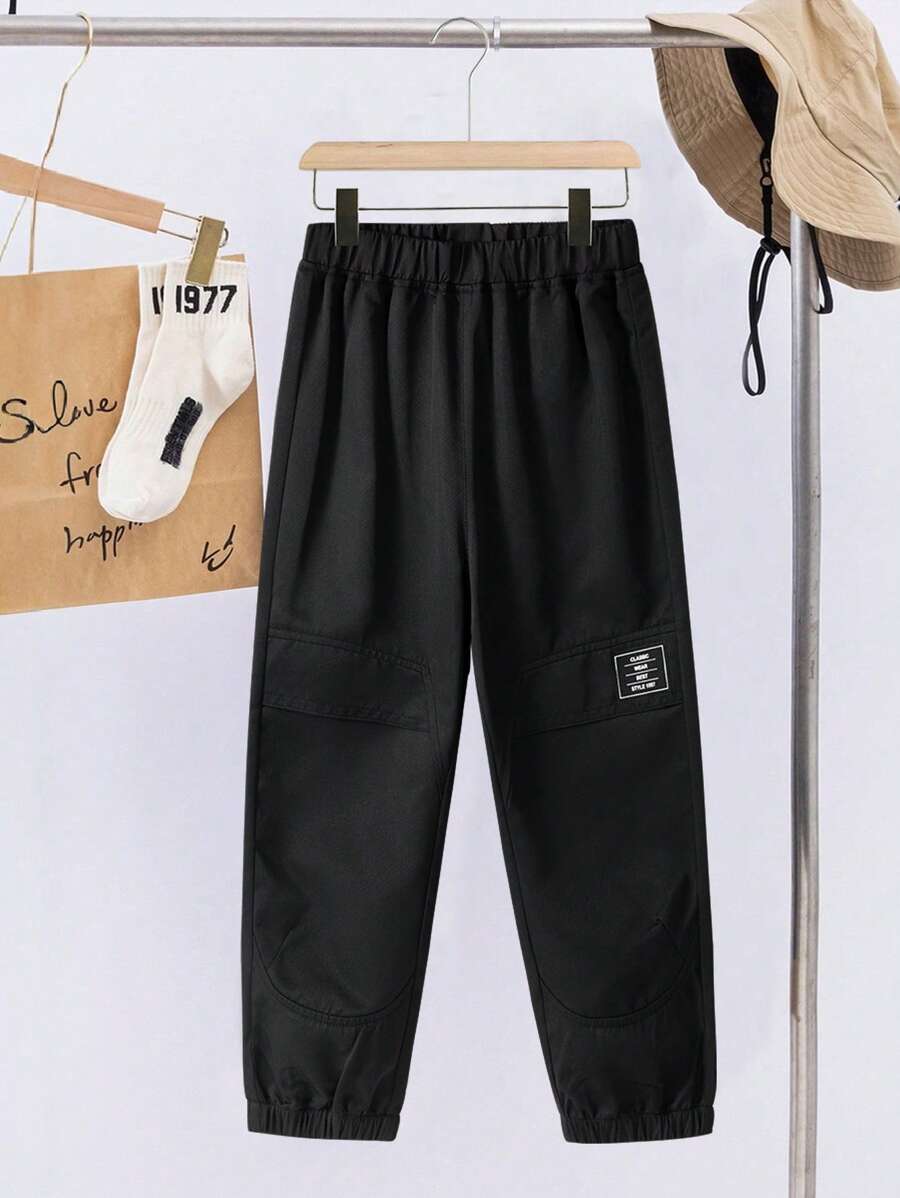 Summer,Holiday,TravelerYoung Boy Plain Minimalist Fashion Casual Long Pants, Suitable For Summer - Black - View 1