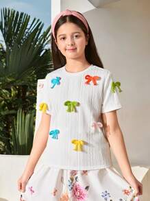 Top de manga corta y cuello redondo ajustado de tejido jacquard con decoración de lazo colorido, apropiado para primavera/verano, salidas de primavera, y vuelta al colegio, para niñas preadolescentes - Blanco - Ver 6