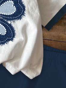 SHEIN 2 Stücke/Set Kleine Mädchen Lässig Blumen Muster Kurzarm Top & Shorts Set, geeignet für den Sommer