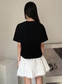 DAZY Set de 2 piezas de parte superior de manga corta con cuello redondo y falda con estampado de letras para niña preadolescente, de estilo minimalista - Negro - Ver 3
