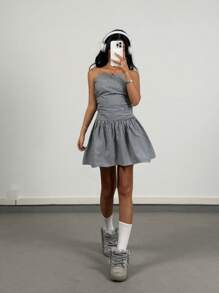 SHEIN Tween Girls Spring/Summer Off-Shoulder Tube Top Red Plaid Pleated Simple Dress Back To School Clothing Suitable Girly Grey And White Striped Pleated Waist A-Line Open Back Mini Dress, Casual Holiday Streetwear - Black and White - View 1