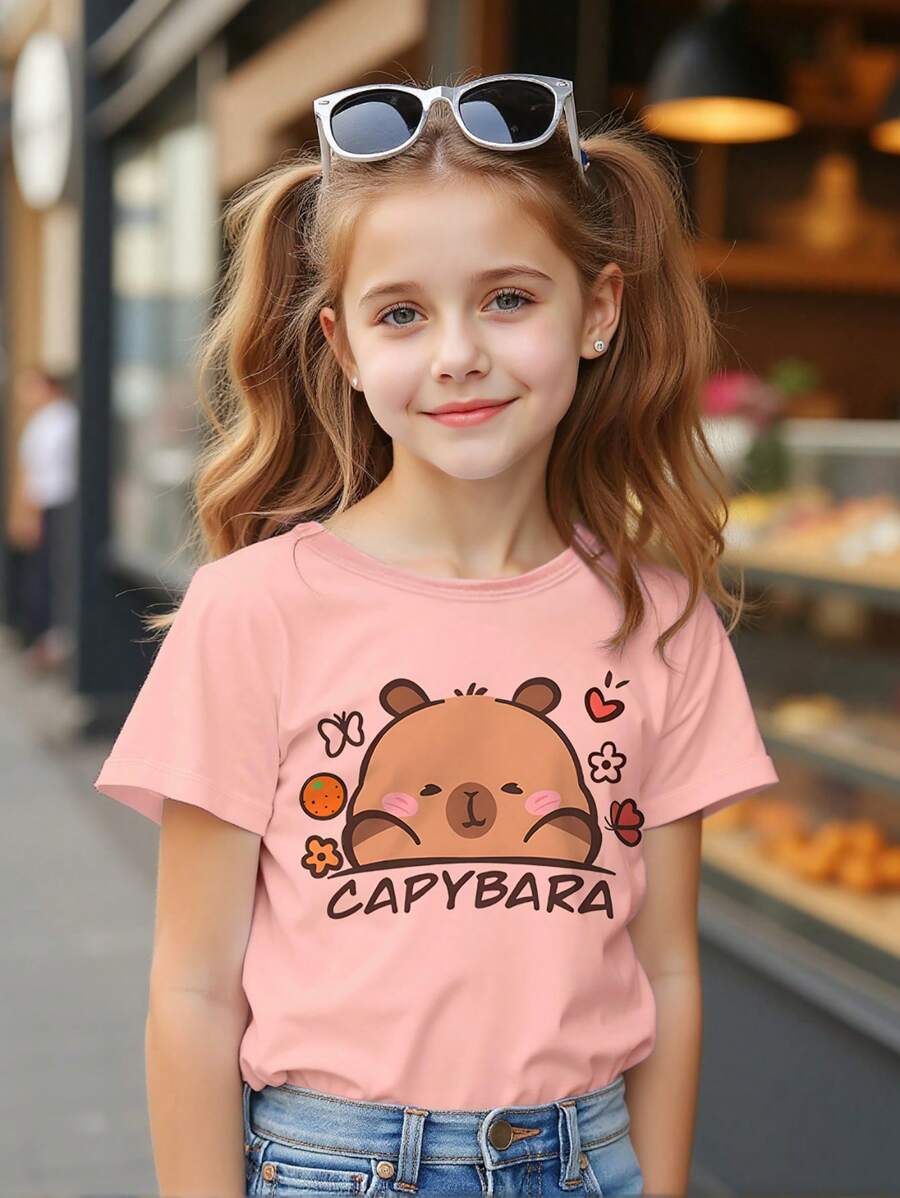 SHEIN Explorewe Camiseta informal de manga corta con cuello redondo y estampado de letra de dibujos animados para niñas preadolescentes - Rosa - Ver 1
