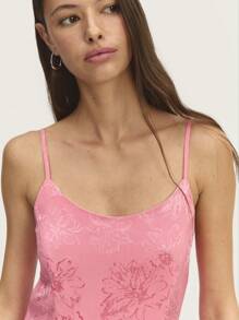 Nöista Bright Pink Mini Dress With Asymmetric Hem, Ruffle Detailing, And Halter Neck With Decorative Rosette. Adjustable Straps, Perfect For Easter, Bridal, Or Graduation. Pair With Sandals For A Fresh, Elegant Look.