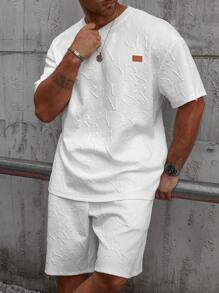 Manfinity Homme Conjunto casual de camiseta y pantalones cortos bordados de tela texturizada para hombre de talla grande