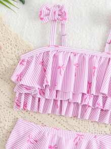 Conjunto de traje de baño para niñas con estampado de moños y volantes, color rosa