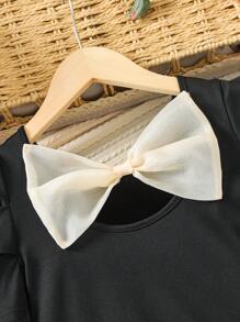 SHEIN Áo thun đen bó sát tay chữ U dệt kim trơn cho bé gái tuổi mới lớn, phong cách công chúa ngọt ngào, thích hợp cho vũ hội tốt nghiệp, tiệc sinh nhật, trở lại trường - màu đen - Xem 4