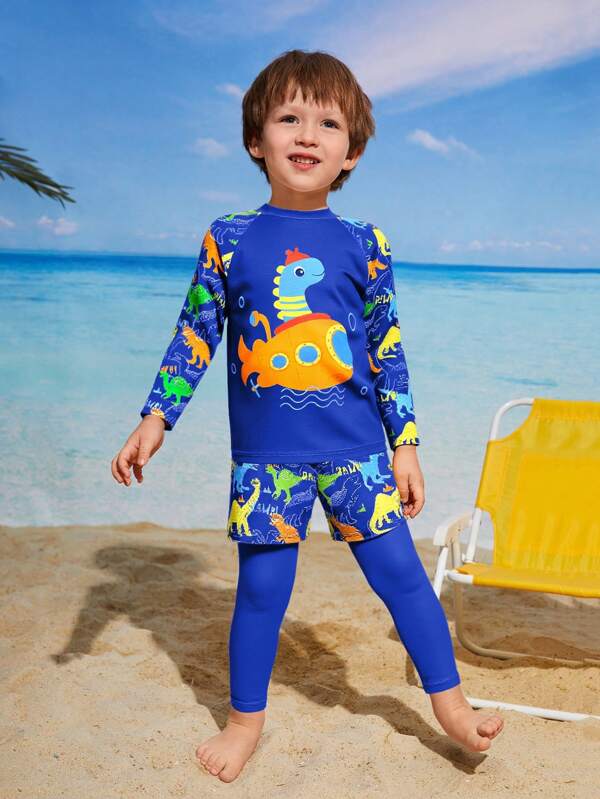 SHEIN Young Boys Swimwear,Boys' Two Pieces Swimsuit For Beach Vacation, Cute Long-Sleeved And Long-Pants Swimsuit With Cartoon Dinosaur Prints For Boys, Suitable For Swimming On Vacation In Spring And Summer