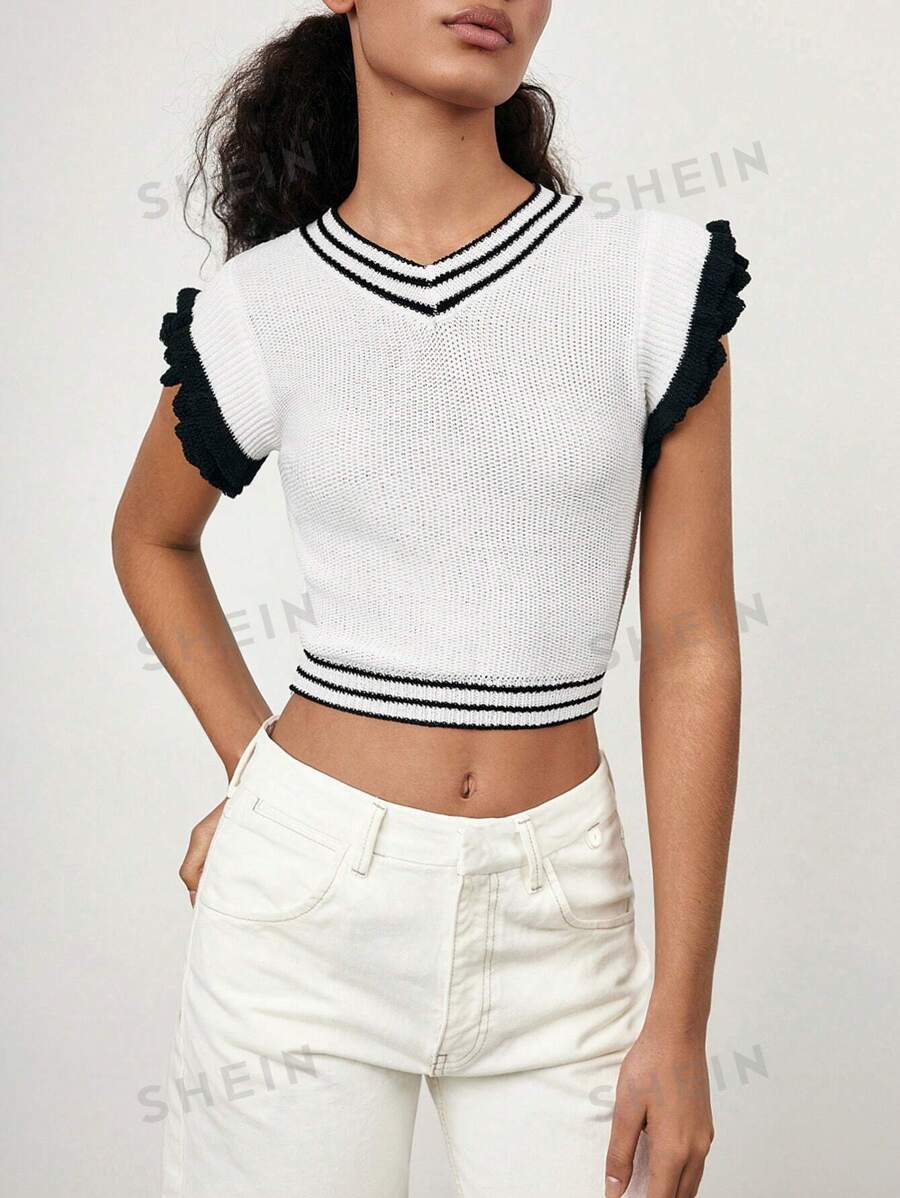 Maija Nuevo diseño de verano 2025 Blusa sin mangas de punto de diseño minimalista con empalmado blanco y negro, abertura calada, volante en el bajo, adecuada para playa, diario, fiesta informal, invitada de boda, festival de música, graduación