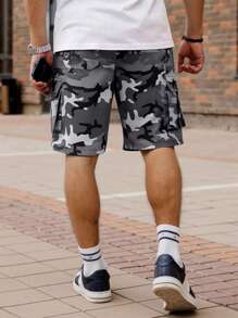 Manfinity EMRG Pantalones cortos tipo cargo para hombres con ajuste holgado, cintura con cordón y bolsillos con solapa