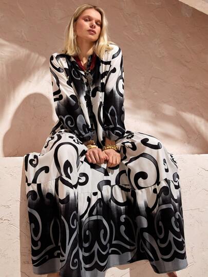 Bóhologie Boho-Chic Black And White Maxi Dress – A Stunning Statement Piece Showcasing An Abstract Swirl Placement Print In Vibrant Blue Tones, Thoughtfully Arranged For A Bold Yet Elegant Look. Designed With A Relaxed Silhouette, Button-Front Detail, And Flowing Fabric, This Effortless Dress Is Perfect For Summer Vacations, Resort Getaways