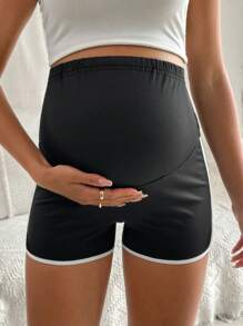 SHEIN Shorts de maternidad de bloques de color asimétricos, minimalista y de moda, adecuados para el verano - Negro - Ver 3