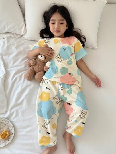 SHEIN Bộ đồ ngủ tay ngắn cổ tròn họa tiết hoa và gấu cho bé gái tuổi teen, phù hợp cho mùa xuân và mùa hè