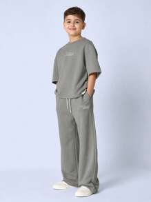 SUMWON Ensemble de survêtement de luxe deux pièces surdimensionné de Californie, Los Angeles. Portez ce survêtement décontracté, sportif et actif pour l'automne, l'hiver et les vacances. Ensemble coordonné douillet et doux. - Gris foncé - Voir 1