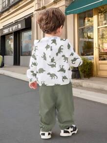 Conjunto de 2 piezas para bebé niño/niña, chaqueta ligera con capucha estampado de dinosaurio en contraste de color y pantalón liso de unicolor, adecuado para primavera, verano, otoño y viajes al aire libre