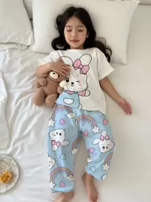 Completo casual casalingo per ragazza pre-adolescente, composto da maglietta a maniche corte e pantaloni, con design carino di coniglio e fiocco, colore azzurro, adatto per l'estate