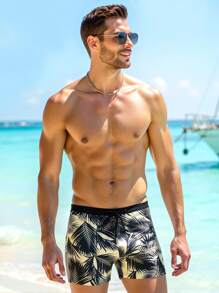 Manfinity VDAYZ Pantalones de baño para hombre con estampado de plantas tropicales (corte asimétrico)
