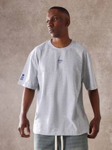 SUMWON Camiseta de estilo urbano de moda gráfica con logo en la espalda, de corte holgado, de la colección casual de verano y primavera, de ajuste relajado, de la marca Sumwon Society