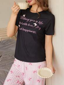 SHEIN 2 件套复古字母设计蝴蝶结装饰圆领 T 恤和格子蝴蝶印花宽松长裤睡衣套装适合青少年女孩 - 黑色 - 查看 1