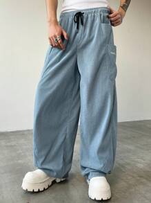 Manfinity Streetrush Pantalon large en velours côtelé pour homme, style streetwear, avec grande poche et conception de broderie de machette fendue