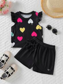 Set de 2 piezas de Top de manga corta con estampado de corazón colorido y falda corta con decoración de moño para niña, conjunto de vestir de verano