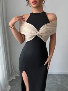 Calvaya Elegante abito color block nero e beige con spacco alto sulla schiena