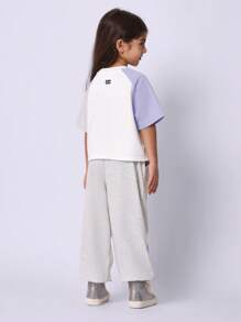 SUMWON Conjunto de dos piezas de jogger estilo NYC - Ropa casual deportiva con bloques de color para entrenamiento y uso en verano y primavera, incluye top de manga corta a juego