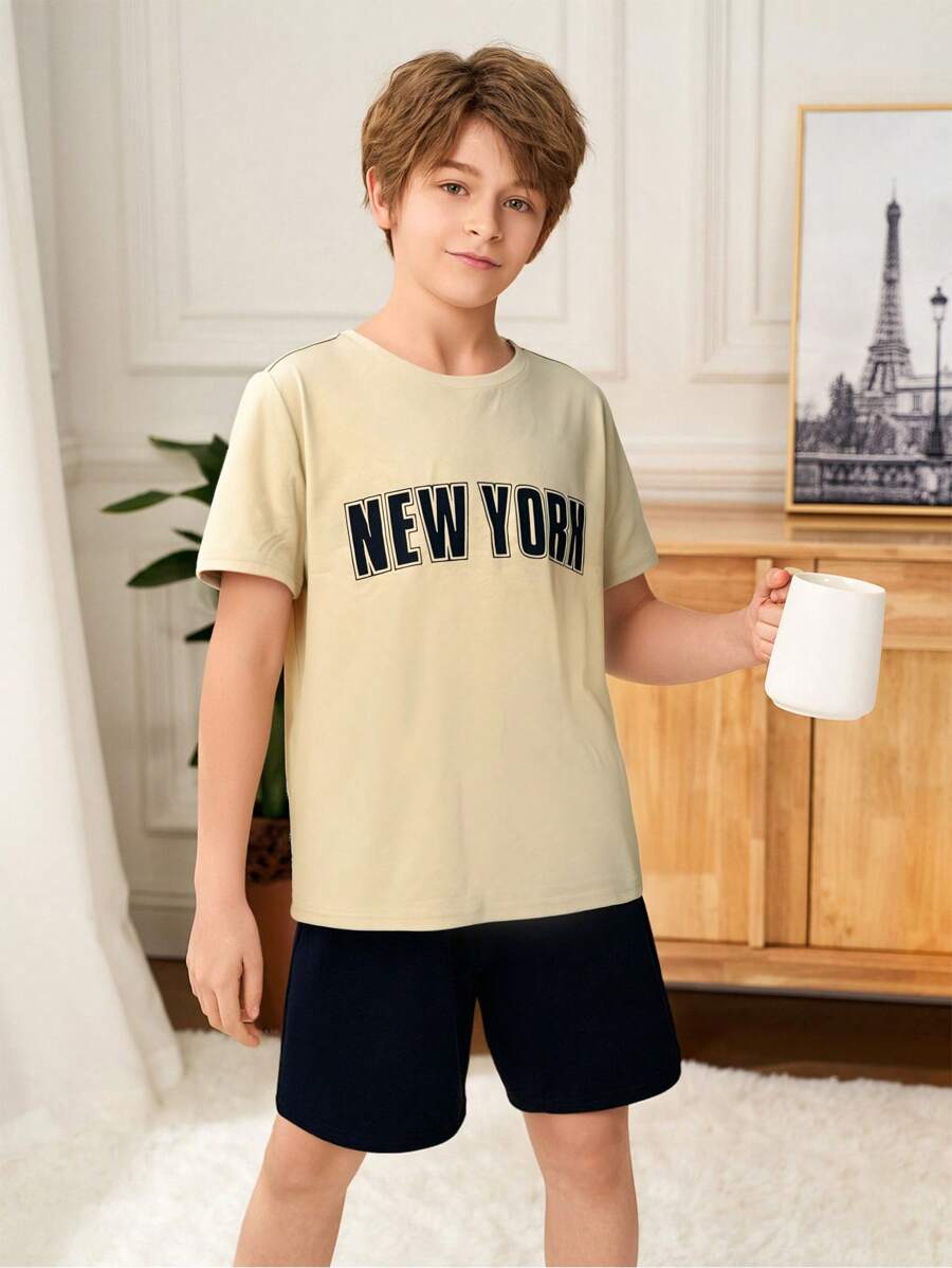 SHEIN Tween Boys Casual Letter Graphic Round Neck Short Sleeve T-Shirt And Shorts 2 Pieces Pajama Set, Loose & Comfy - Black and White - View 1