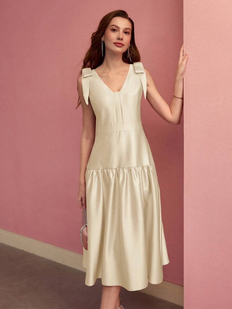 Vestido midi con cuello en V y hombros con lazo