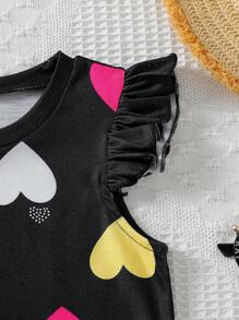 Set de 2 piezas de Top de manga corta con estampado de corazón colorido y falda corta con decoración de moño para niña, conjunto de vestir de verano
