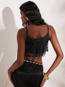 Opulessa Top a canotta lavorato a maglia con orlo asimmetrico e dettagli in pizzo