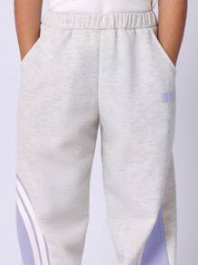 SUMWON Conjunto de dos piezas de jogger estilo NYC - Ropa casual deportiva con bloques de color para entrenamiento y uso en verano y primavera, incluye top de manga corta a juego