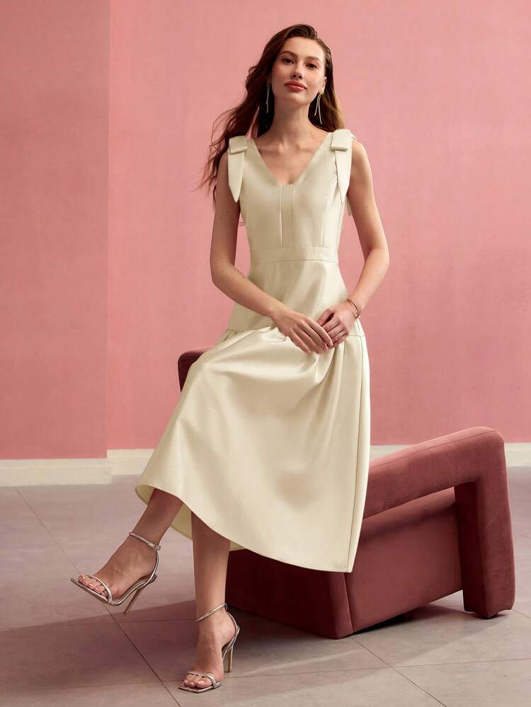 Vestido midi con cuello en V y hombros con lazo