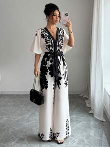 Chiquease 女士优雅度假撞色深 V 领蝙蝠袖宽松上衣，系腰带和花卉印花阔腿连体裤 - 杏色 - 查看 1