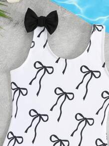 Young Girls One-Pieces - Adorable Black Bow One-Piece Swimsuit. Features Soft Knitted Fabric, Contrast Color Ruffle Trim On Shoulders, And A Classic Bow Accent. Fashionable, Casual, Yet Chic Design. Perfect For Swimming, Summer Vacations, Beach Trips, Pool Parties, And Holiday Getaways. - Black and White - View 4