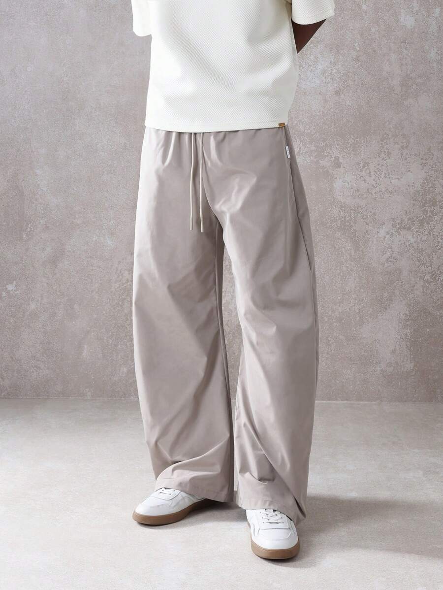 SUMWON 优质马蹄形套脚裤轻盈舒适阔腿休闲裤秋春宽松版型日常商务休闲办公室装