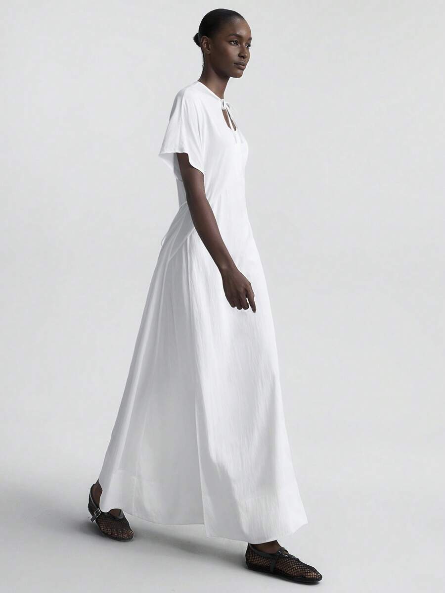 Ontre Váy xòe rộng mùa hè mới 2022 cho nữ, váy dài tay rộng rãi thắt nơ phía trước màu trắng