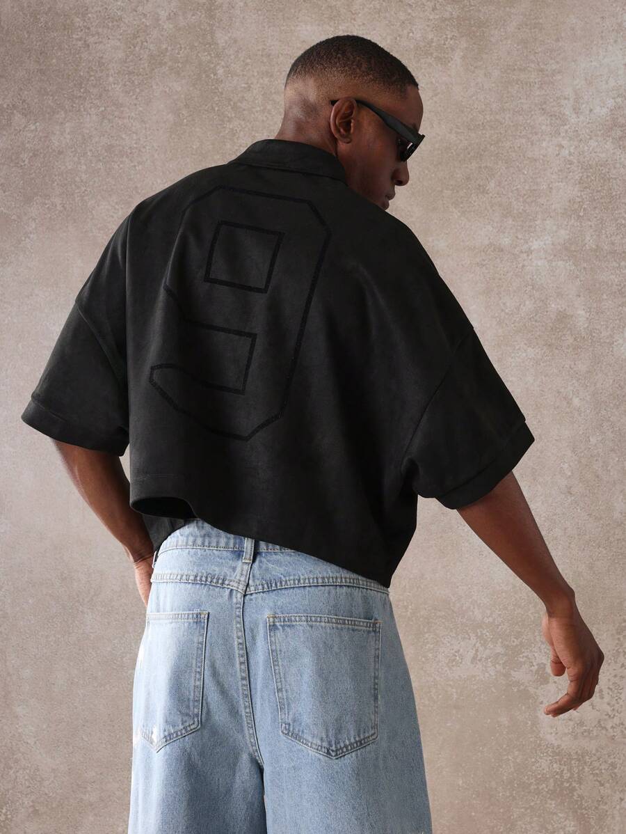 Camisa polo premium Sudette de ajuste oversize, de manga corta, casual, deportiva, diseño contemporáneo, ropa urbana y esencial para hombres, colección primavera verano - Negro - Ver 1