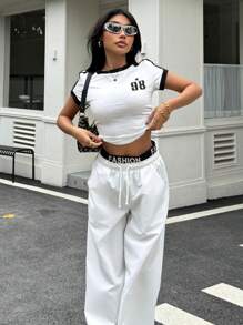 SHEIN Conjunto de blusa manga corta a contraste y pantalón ancho de pierna suelta en color blanco, look deportivo y urbano para adolescentes