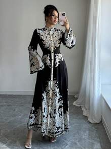 Calvaya Elegante abito con maniche a zampa e stampa paisley