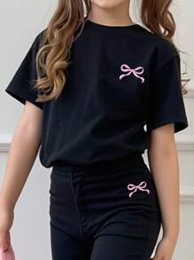 SHEIN Set de 2 piezas para niñas jóvenes con camiseta de manga corta de cuello redondo y decoración de mariposa holgada y pantalones anchos para el verano