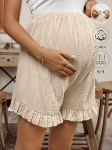 SHEIN Pantalones cortos de maternidad informales y versátiles de unicolor con volante en la cintura