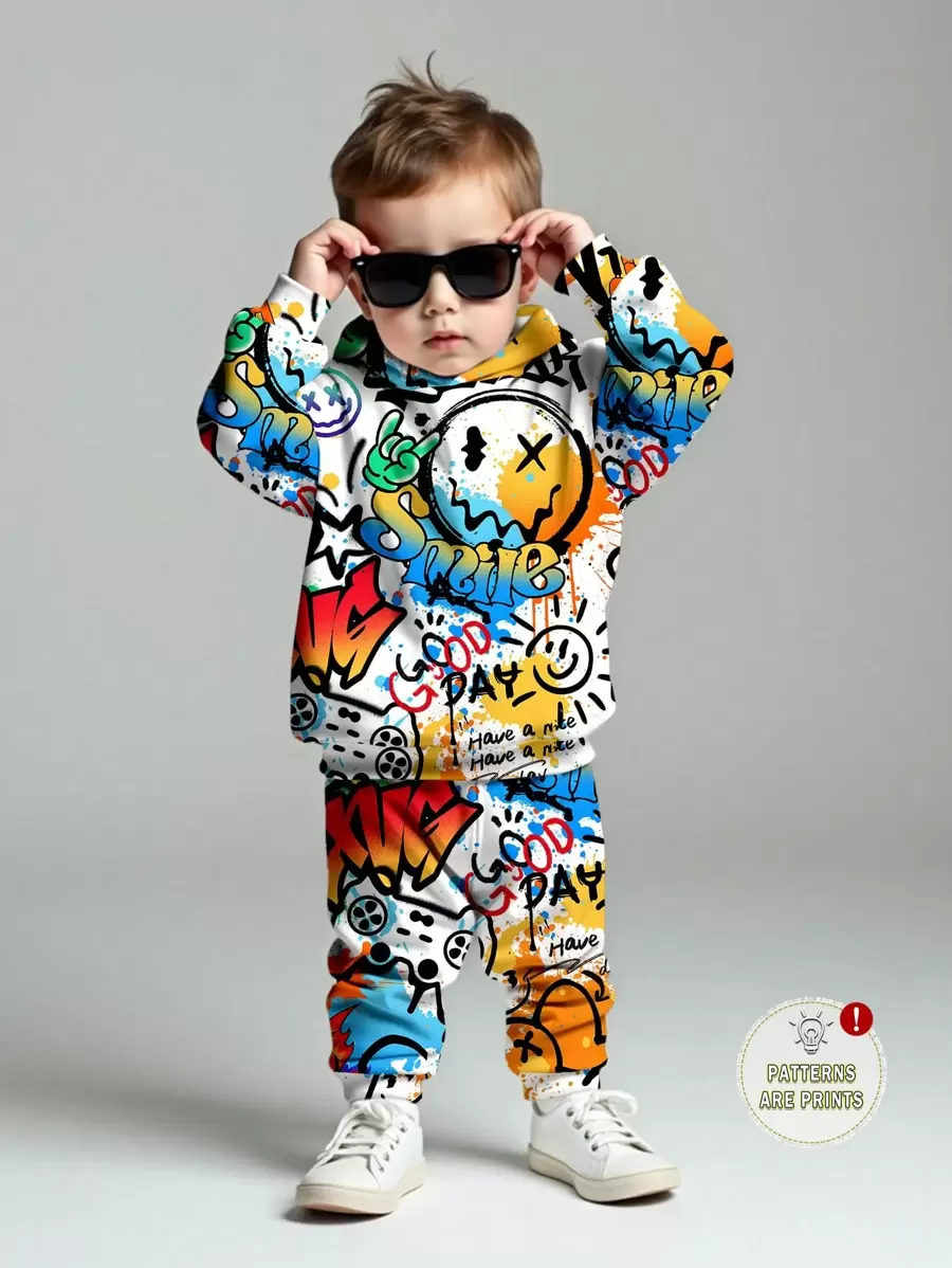 SHEIN 男婴休闲卡通抽象图案宽松针织柔软连帽运动服，适合秋冬季