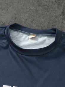 SHEIN مجموعة تي شيرت رياضي أكمام قصيرة فضفاض بطباعة كرة القدم ملابس الرياضة الفضفاضة وبناطيل رياضية فضفاضة مطبوع عليها حرف لمراهقين