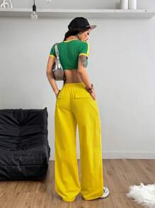 Coolane Pantalones de tiro bajo de tejido para deportes Streetwear y ropa deportiva de mujer con cinta de bloque central