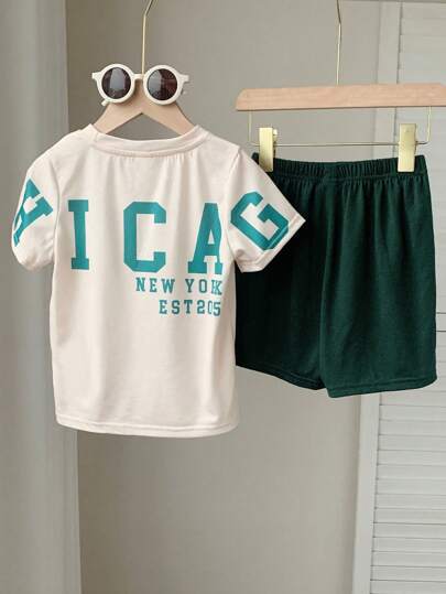 SHEIN Leap Crew 2 件套年轻男孩休闲学院简约字母印花圆领短袖 T 恤和松紧腰部舒适针织短裤套装，适合生日派对、晚会、表演、婚礼