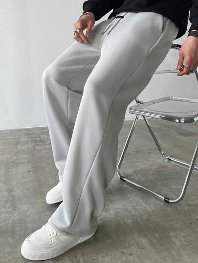 Claim Dot Pantalones de chándal casuales sueltos con cordón en la cintura y bolsillos para hombre