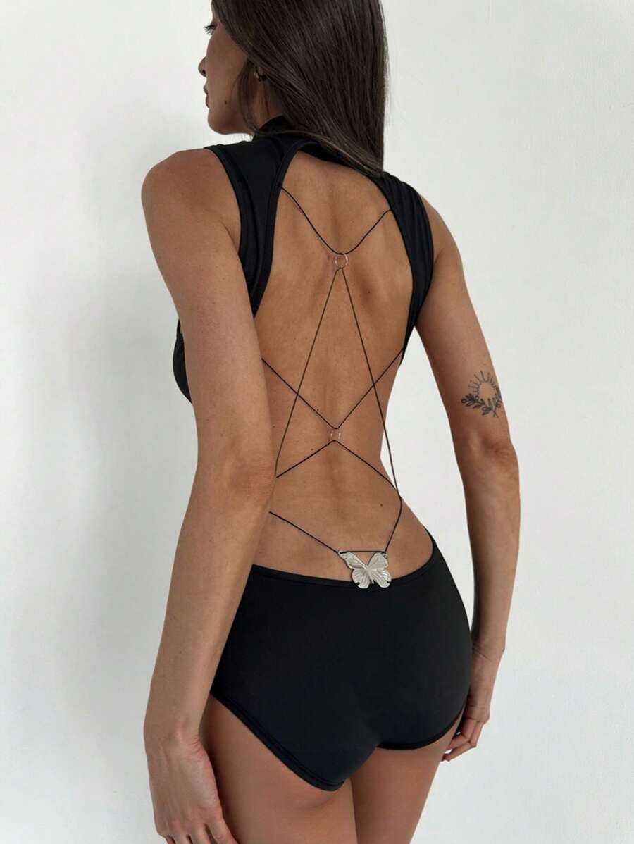 Aloruh Nouveau body sexy noir sans dos à décoration de croisillons, sans manches. Ajusté à la peau et affinant