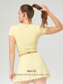GLOWMODE FeatherFit™ Focus Drawstring Pleated Short Sleeve Tee Light Support Low Impact Yoga Pilates Studio Gym - French Vanilla - View 2