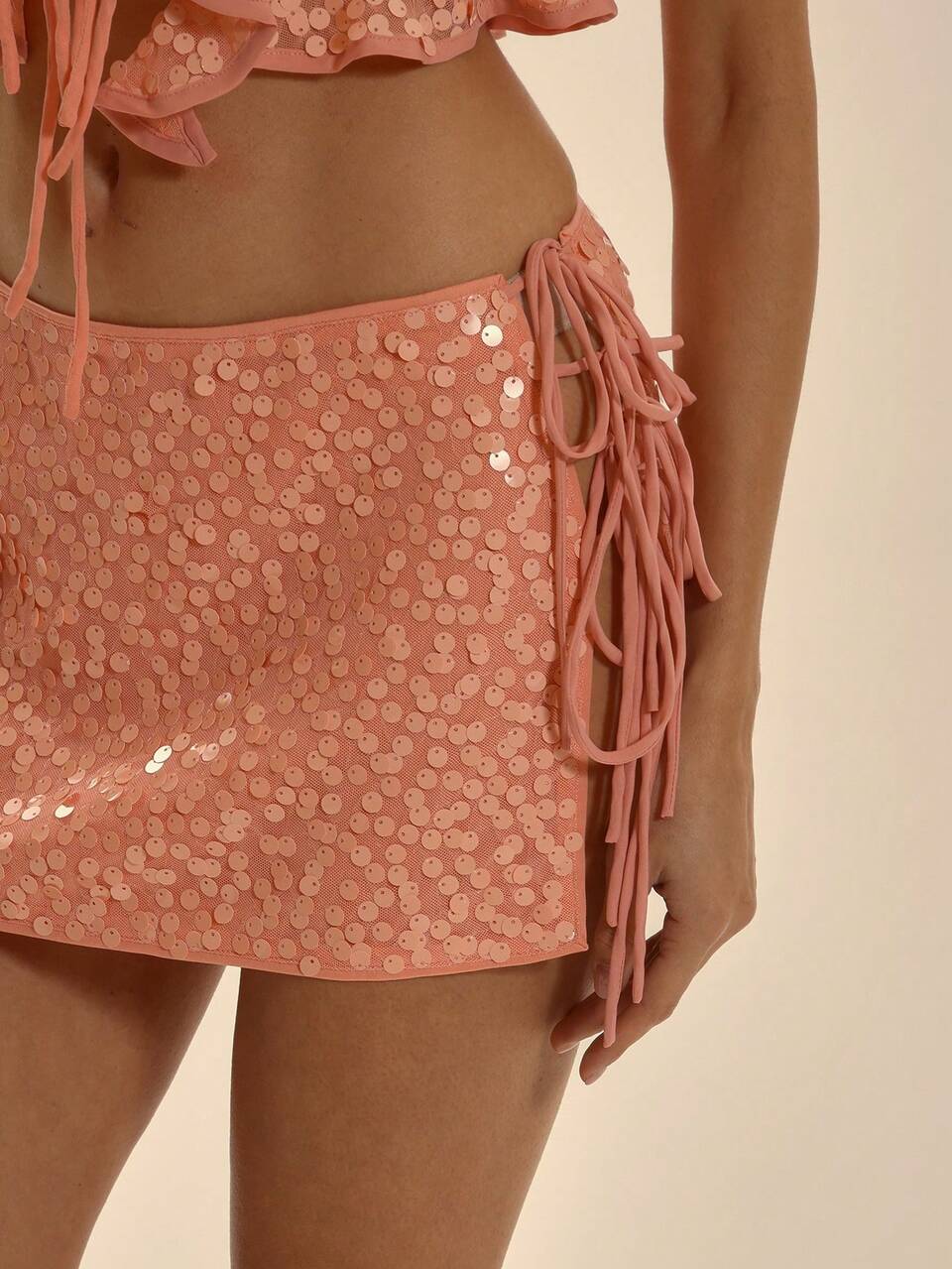 Mini-jupe à paillettes avec liens sur les côtés, taille basse, printemps-été, élégante, pour vacances, soirées, mignonne et sexy. Convient pour les occasions festives et les vacances.