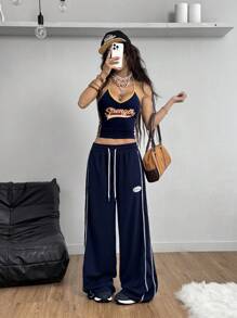 Coolane Top deportivo sin espalda de mujer en azul y color de contraste